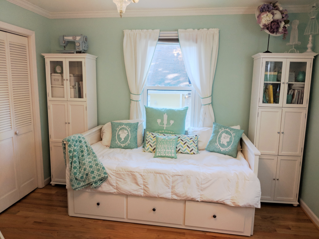 Mint green wall and storage
